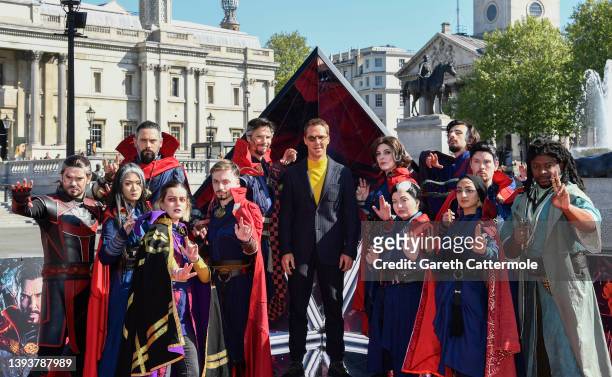 Benedict Cumberbatch with cosplayers at the photocall for Marvel Studios' "Doctor Strange in the Multiverse of Madness" in Trafalgar Square on April...