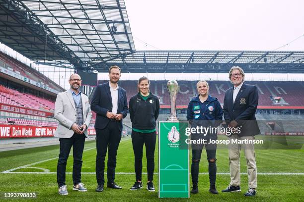 Lutz Wingerath, Robert Voigtsbeger, Lisa Weiß, Isabel Kerschowski and Toni Schumacher pose with the trophy during Women's DFB Cup Final - Finalists...