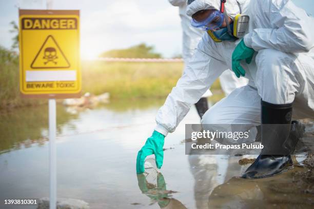 scientist examing toxic water - blood stream stock pictures, royalty-free photos & images