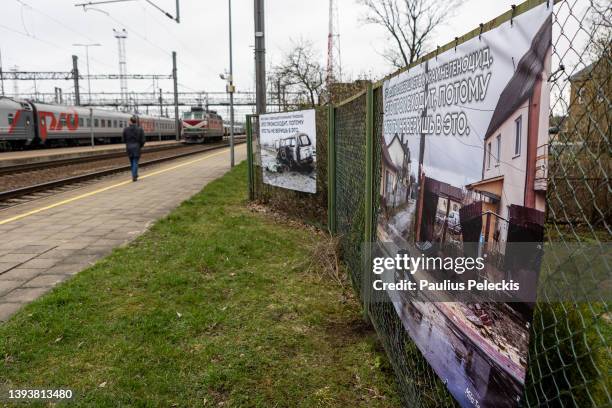 Photograph by Ukrainian photographer Mila Teshaieva of Russia's war in Ukraine are displayed as part of an exhibition at the railway station where...