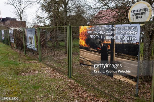 Photograph by Ukrainian photographer Maxim Dondyuk of Russia's war in Ukraine are displayed as part of an exhibition at the railway station where...