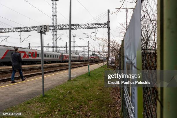 Photographs of Russia's war in Ukraine are displayed as part of an exhibition at the railway station where train from Moscow to Kaliningrad passes by...