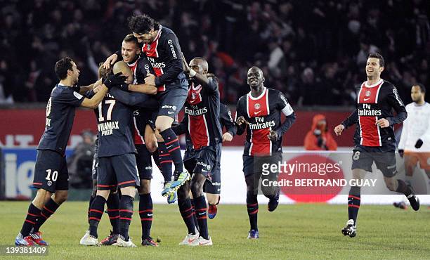 Paris' Alex Rodrigo Dias Da Costa celebrates with teammates after scored a goal during the French L1 football match Paris-Saint-Germain vs....