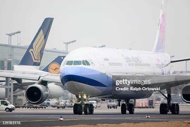 An aircraft of China Airlines drives along the tarmac at Frankfurt International Airport on February 17, 2012 in Frankfurt am Main, Germany. The GdF...