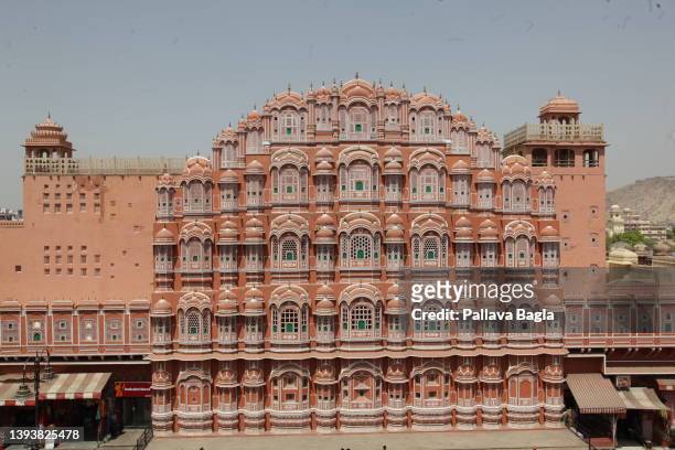 The magnificent and imposing facade of the palace of Hawa Mahal in the desert city of Jaipur also called the Pink City seen on April 24, 2022 in...