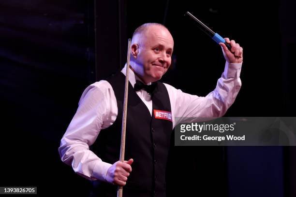 John Higgins of Scotland takes to the arena floor during the Betfred World Snooker Championship Quarter Final match between John Higgins of Scotland...