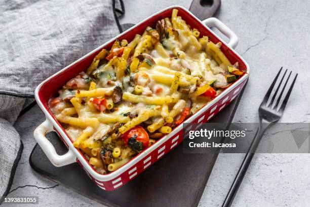 pasta bake in baking dish - noodle casserole stock pictures, royalty-free photos & images
