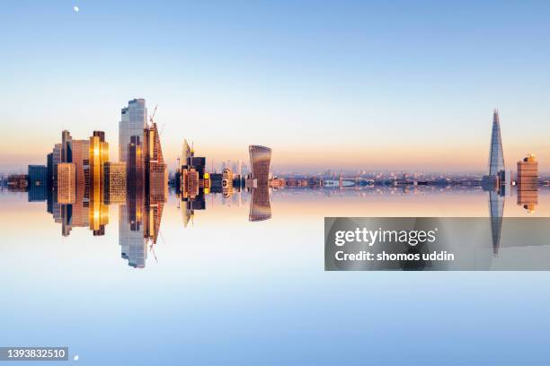 mirror image of london city skyline - double exposure - banker doppelbelichtung stock-fotos und bilder