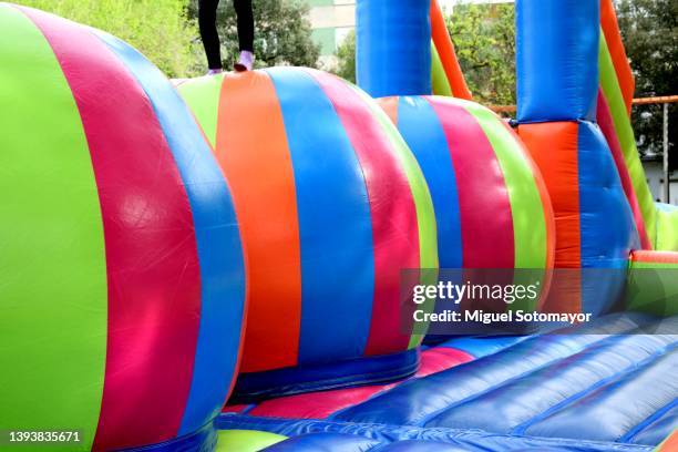 inflatable children's game - inflatable playground stock pictures, royalty-free photos & images