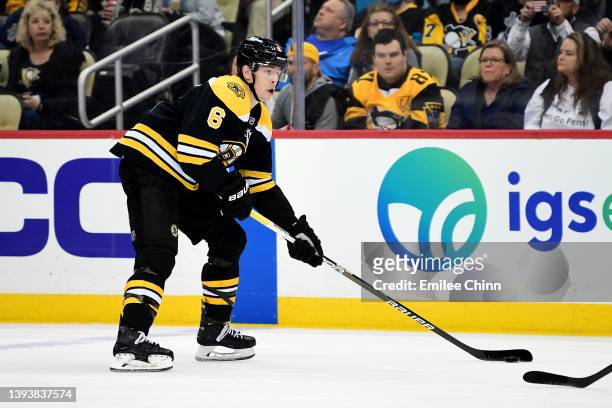 Mike Reilly of the Boston Bruins controls the puck during a game between the Pittsburgh Penguins and Boston Bruins at PPG PAINTS Arena on April 21,...