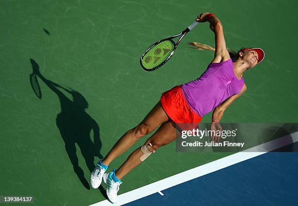 Maria Kirilenko of Russia serves to Monica Niculescu of Romania during day one of the WTA Dubai Duty Free Tennis Championship on February 20, 2012 in...
