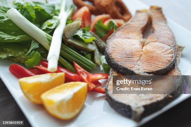 salmon with salad - baked salmon stock pictures, royalty-free photos & images