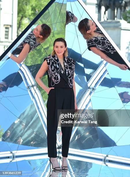 Elizabeth Olsen attends the "Doctor Strange In The Multiverse Of Madness" Photocall at Trafalgar Sq on April 26, 2022 in London, England.