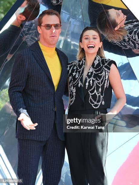 Benedict Cumberbatch and Elizabeth Olsen attend the "Doctor Strange In The Multiverse Of Madness" Photocall at Trafalgar Sq on April 26, 2022 in...