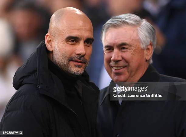 Pep Guardiola, Manager of Manchester City and Carlo Ancelotti, Head Coach of Real Madrid look on prior to the UEFA Champions League Semi Final Leg...