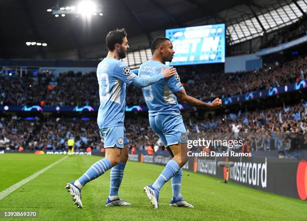 Gabriel Jesus of Manchester City celebrates with teammate Bernardo Silva after scoring their side's second goal during the UEFA Champions League Semi...