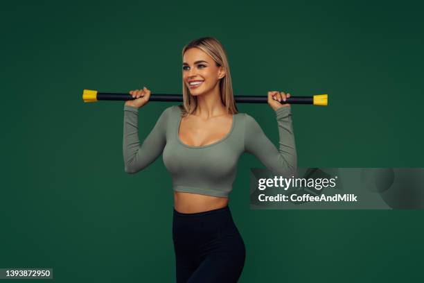 fitness woman - woman standing exercise stock pictures, royalty-free photos & images