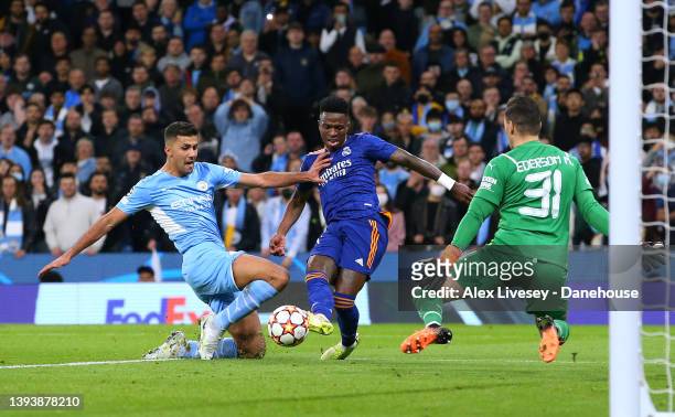 Vinicius Junior of Real Madrid scores their second goal past Ederson of Manchester City during the UEFA Champions League Semi Final Leg One match...