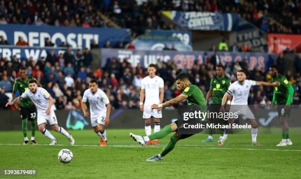 Dominic Solanke of AFC Bournemouth scores their sides second goal from the penalty spot during the Sky Bet Championship match between Swansea City...