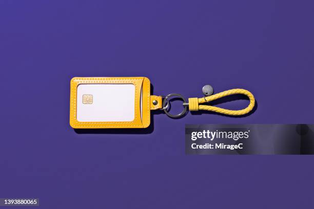 smart chip card in yellow leather wallet - luggage tag stock pictures, royalty-free photos & images