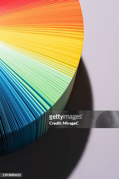 gradient color paper pages fanned out - fan shape stock pictures, royalty-free photos & images