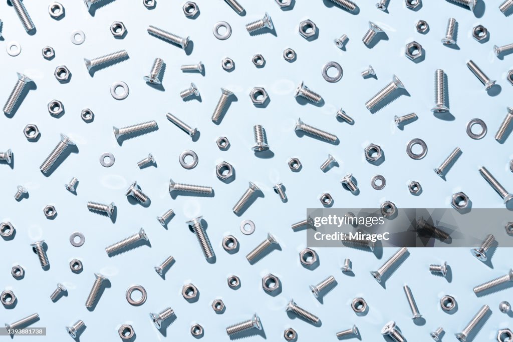 Screws and Nuts on Blue Full Frame Pattern