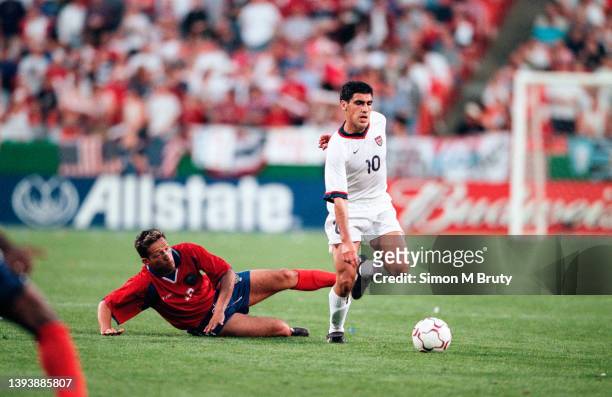 Claudio Reyna of USA and Rodrigo Cordero of Costa Rica in action during the World Cup Qualification match between USA and Costa Rica at Arrowhead...