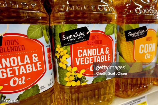 Cooking oils made from canola from Canada and soybeans are offered for sale at a grocery store on April 26, 2022 in Chicago, Illinois. The price of...