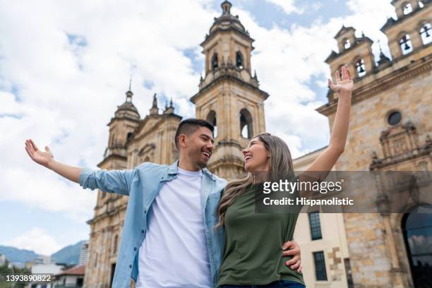 couple looking very happy sightseeing in bogota - colombia 個照片及圖片檔