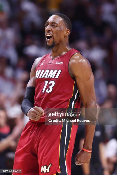 Bam Adebayo of the Miami Heat celebrates a basket against the Atlanta Hawks during the first half in Game Five of the Eastern Conference First Round...