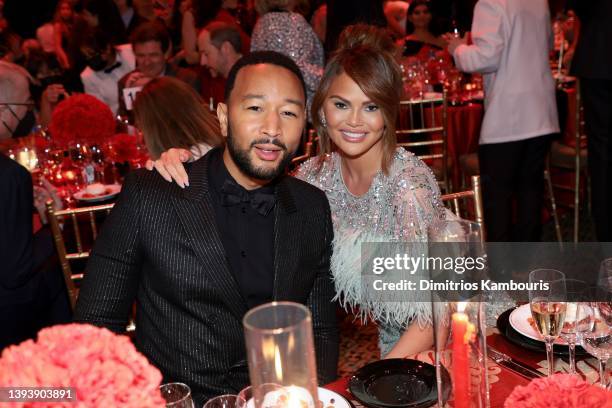 John Legend and Chrissy Teigen attend the City Harvest Presents The 2022 Gala: Red Supper Club at Cipriani 42nd Street on April 26, 2022 in New York...