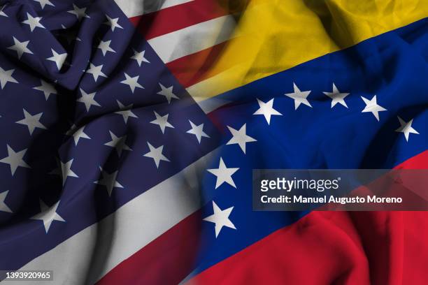 flags of venezuela and the united states of america - rebel flag backgrounds stock pictures, royalty-free photos & images