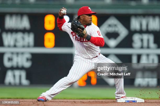 Jean Segura of the Philadelphia Phillies throws the ball against the Colorado Rockies at Citizens Bank Park on April 26, 2022 in Philadelphia,...