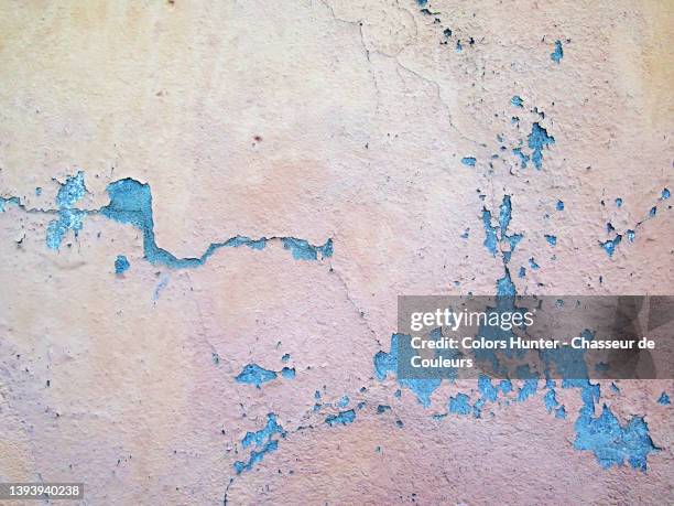 weathered, scratched white and blue paint on a wall in paris - cracked plaster stock pictures, royalty-free photos & images