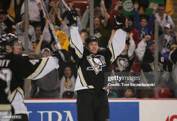 Ryan Malone of the Pittsburgh Penguins celebrates as he scores a goal in the second period during their NHL game against the Ottawa Senators on...