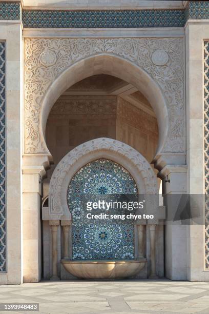 morocco, exterior of casablanca archway, hassan ii mosque series - ムーア様式 ストックフォトと画像