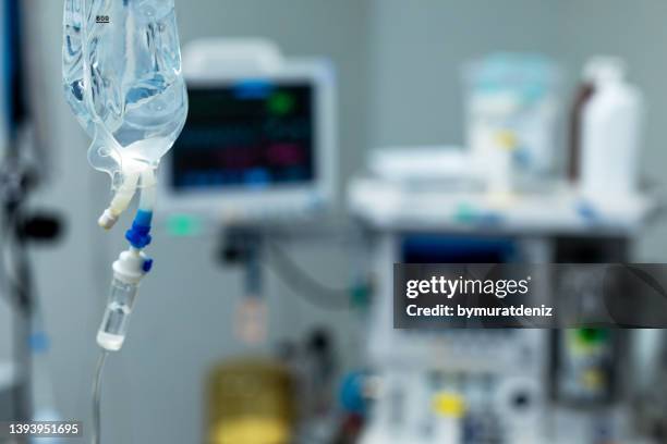 iv drip with serum - saltlösning bildbanksfoton och bilder