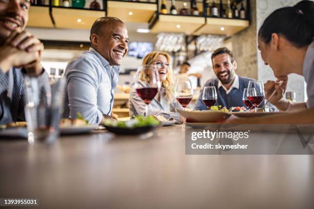 group of cheerful business people having fun on a lunch. - smart casual lunch stock pictures, royalty-free photos & images