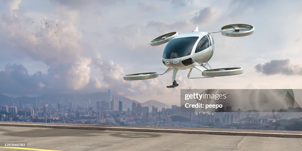 EVTOL Electric Vertical Take Off and Landing Aircraft About To Land Near City