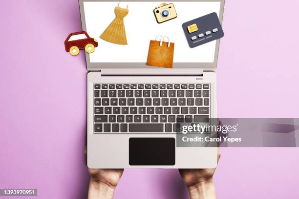 commerce and shooping items made of felt in laptop.online shooping. pink  background - credit rating stock pictures, royalty-free photos & images