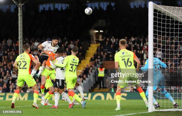 Aleksandar Mitrovic of Fulham wins a header during the Sky Bet Championship match between Fulham and Nottingham Forest at Craven Cottage on April 26,...