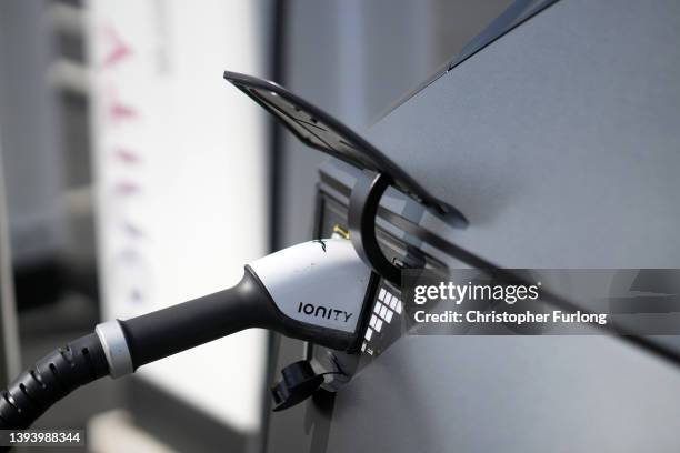 Hyundai Ioniq battery electric vehicle charges at an Ionity GmbH electric car charging station at Skelton Lake motorway service area on April 26,...