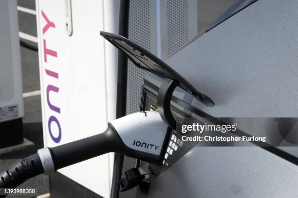 Hyundai Ioniq battery electric vehicle charges at an Ionity GmbH electric car charging station at Skelton Lake motorway service area on April 26,...