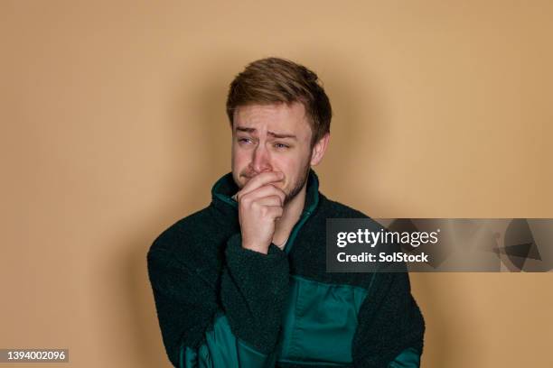 everyone needs a cry - crying man stock pictures, royalty-free photos & images