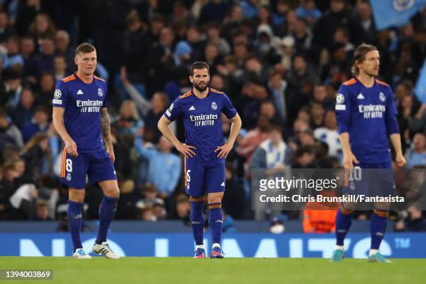 Nacho of Real Madrid reacts after Manchester City's third goal during the UEFA Champions League Semi Final Leg One match between Manchester City and...