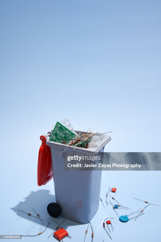 Electronic Waste Container Example Electronic Waste Inside A Waste Container On Blue Background High-Res ...