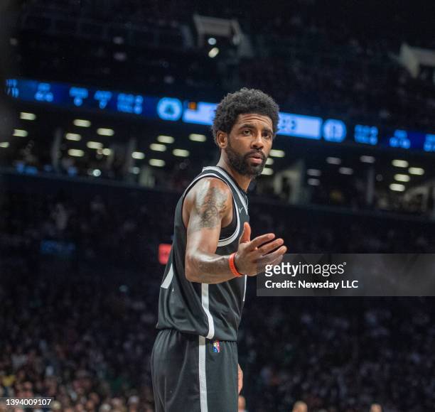 Brooklyn Nets' Kyrie Irving looking for the inbound of the ball while playing the Boston Celtics in the first quarter at the Barclays Center in...