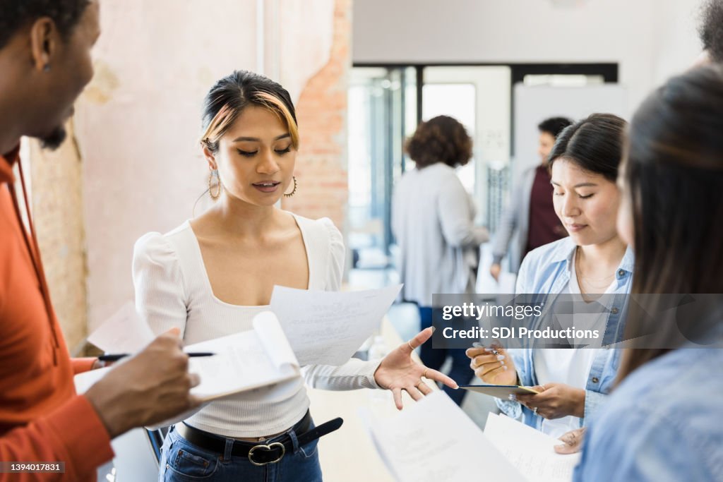 Directors take notes as actress reads part