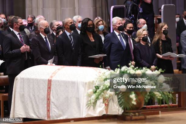 President Joe Biden, former U.S. President Barack Obama and former first lady Michelle Obama, former U.S. President Bill Clinton and his wife and...