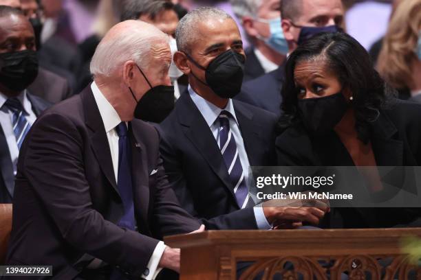 President Joe Biden, former U.S. President Barack Obama and former first lady Michelle Obama attend the funeral service for former U.S. Secretary of...